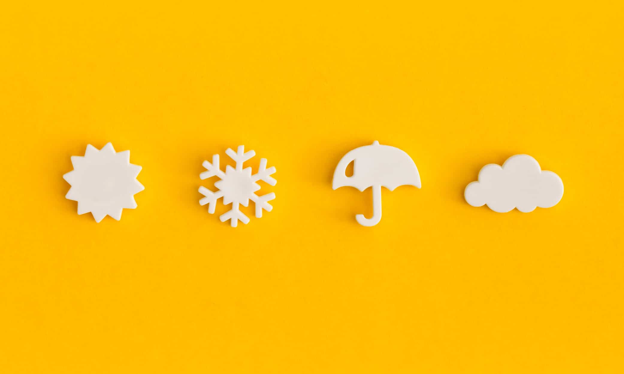 weather icons representing seasons on La Costa Brava